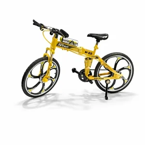 Foto de Miniatura Bicicleta Star 19cm – Metal Resistente e Rodas de Borracha